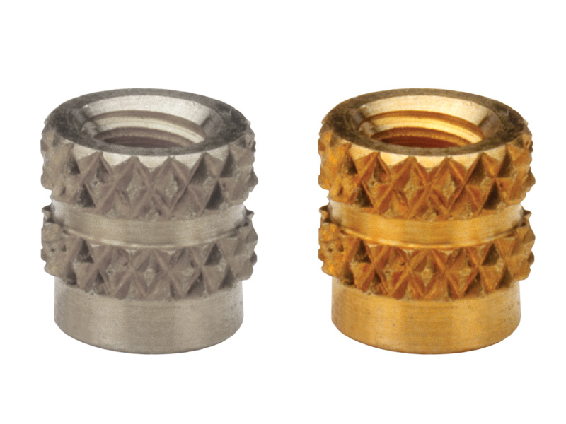 Through-hole threaded inserts for use in molded-in applications in plastic